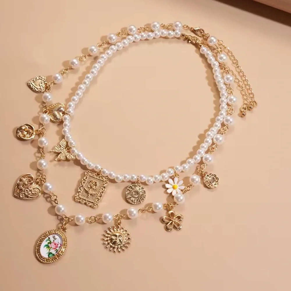 Women 2x Gold and Pearl Charm Necklace